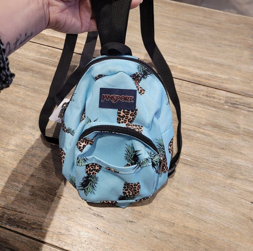 Jansport blue with pineapple baby backpack
