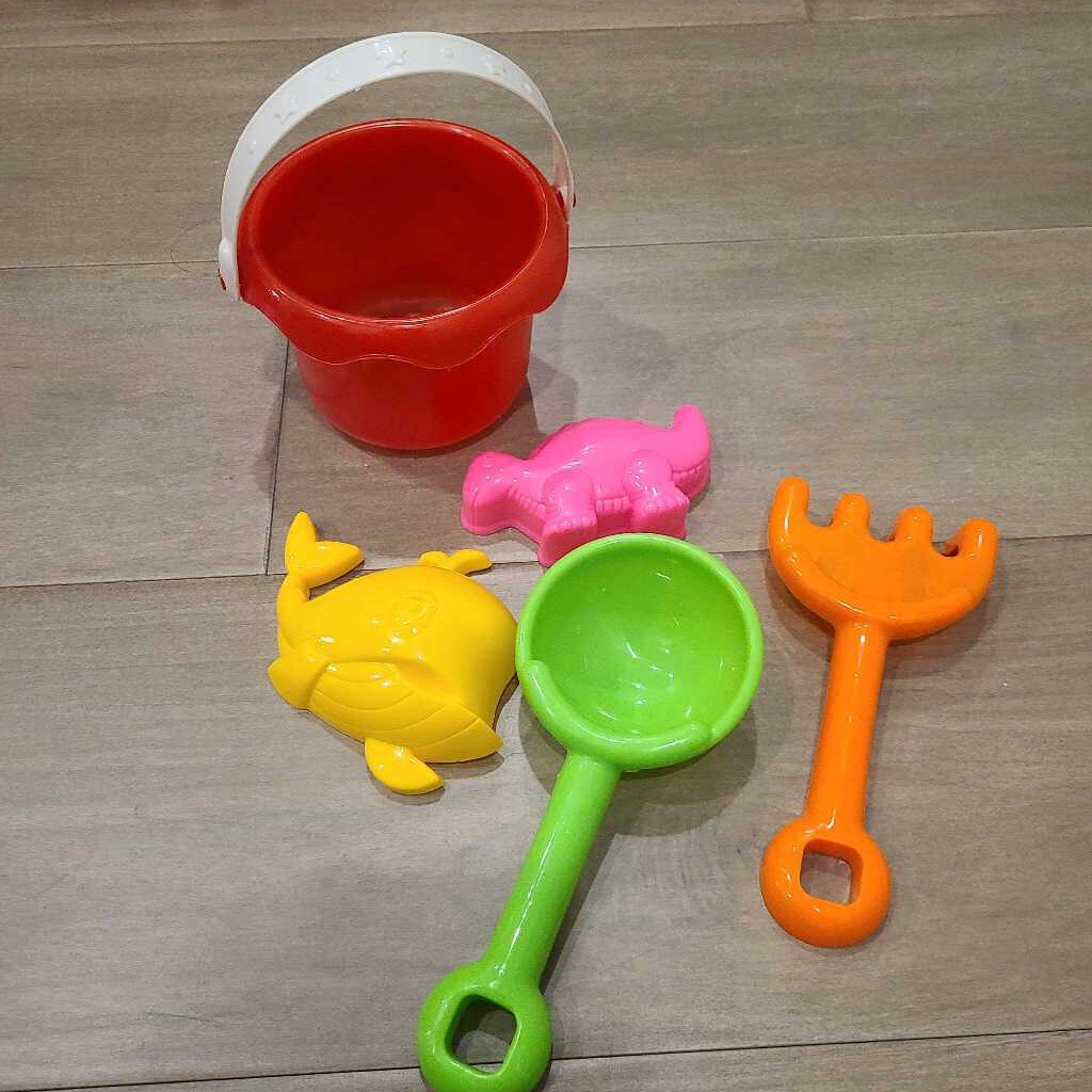 Red plastic sand pail with 4 accessories