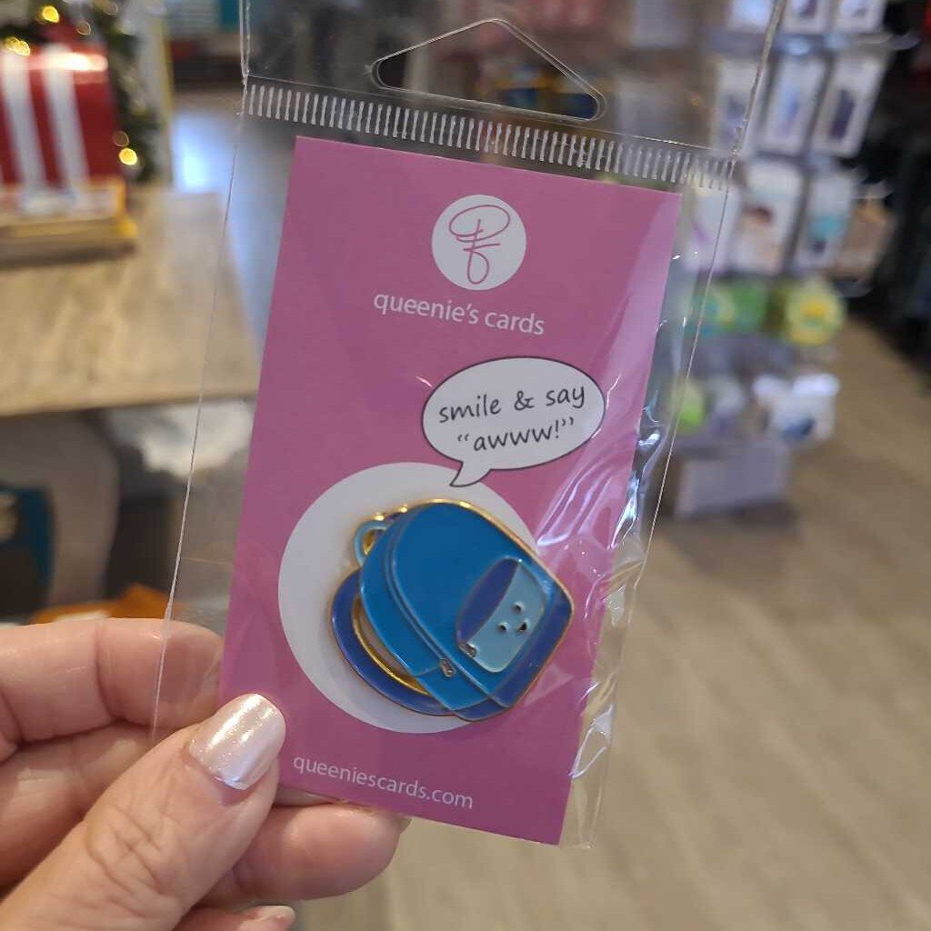 Queenies Cards blue backpack pin